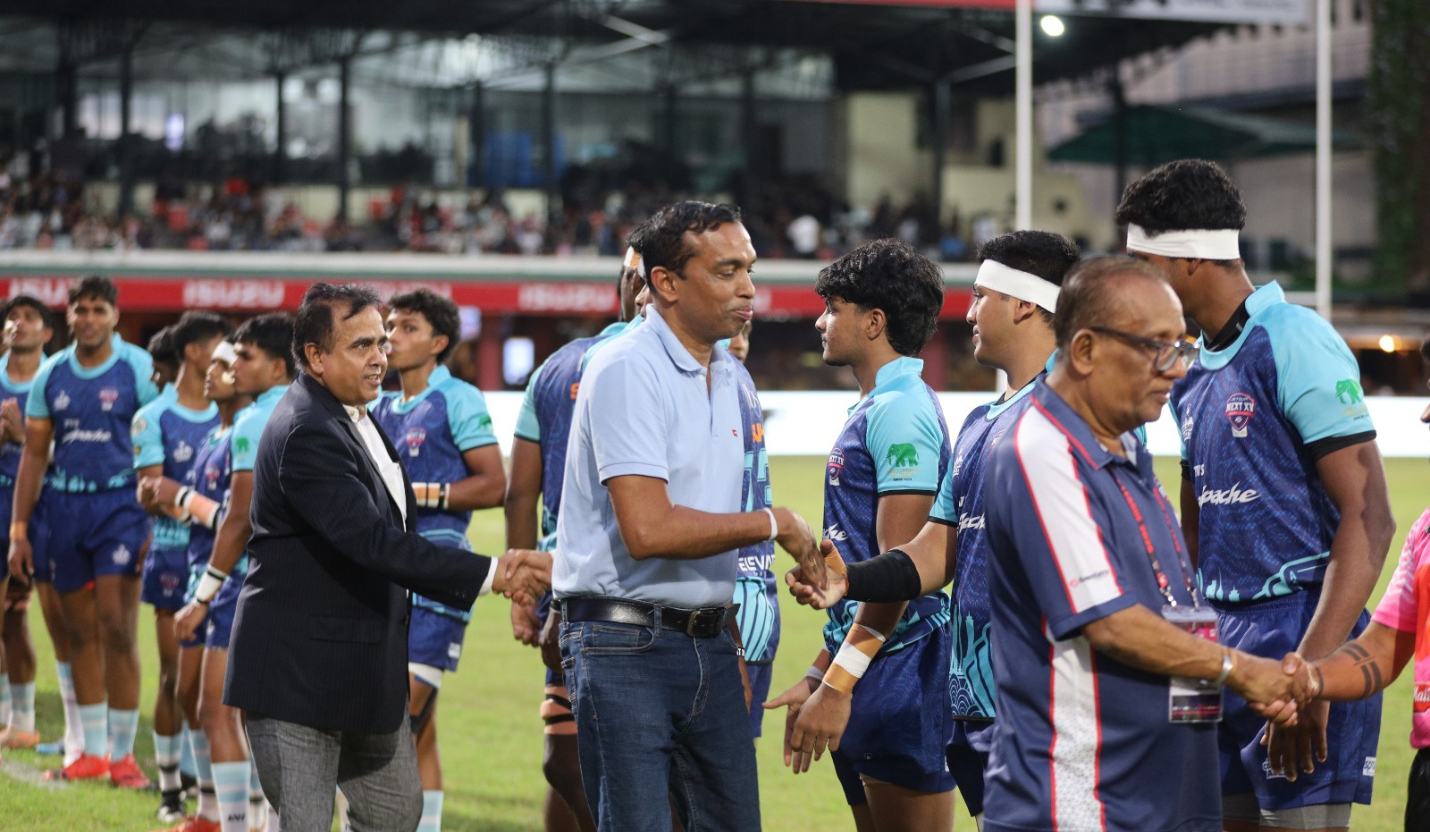SLT-MOBITEL leadership and Sri Lanka Rugby officials greeting players during the team line-up at the Jetour Next XV Rugby League Final